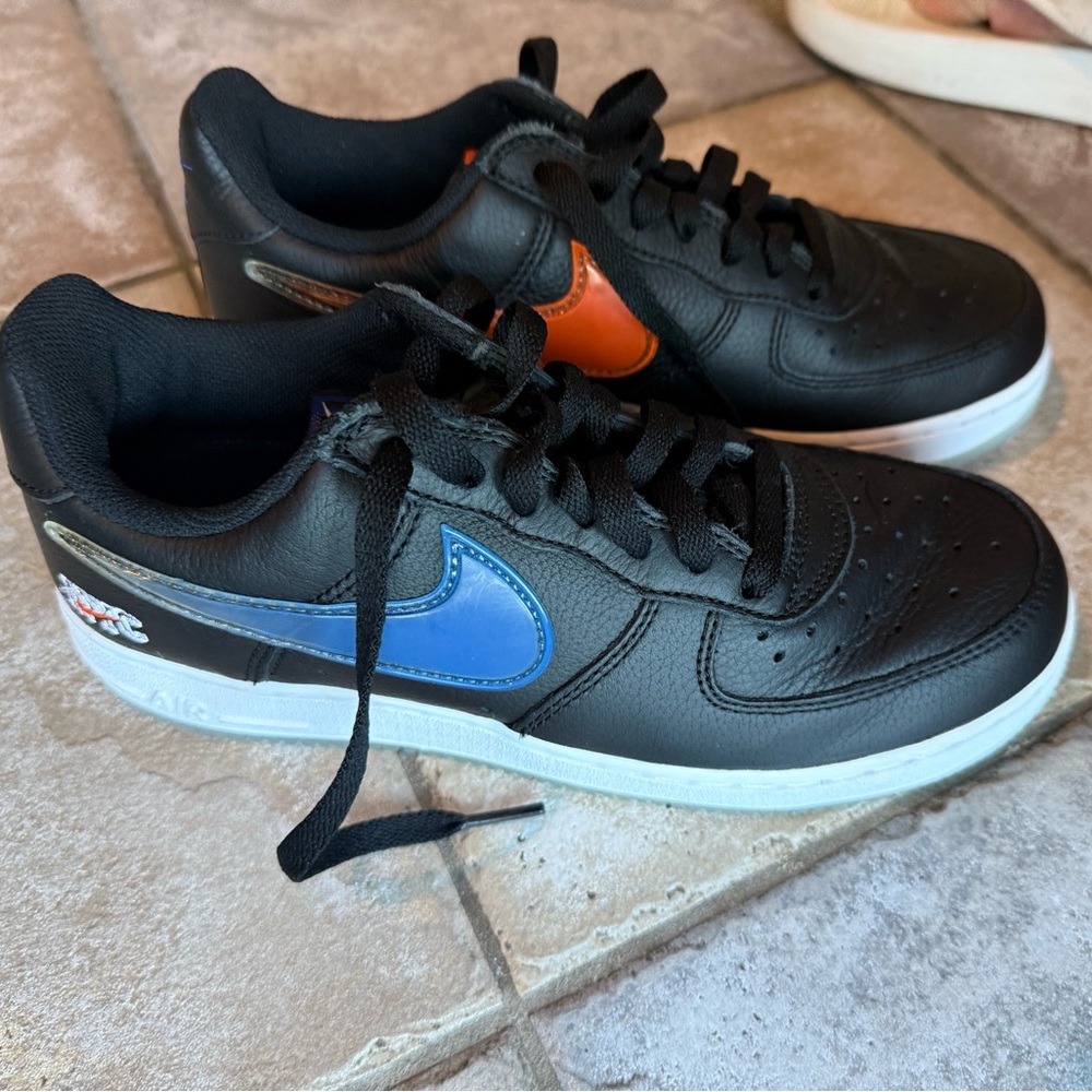 Nike men’s or women’s Black and Blue Air Force Ones special edition
